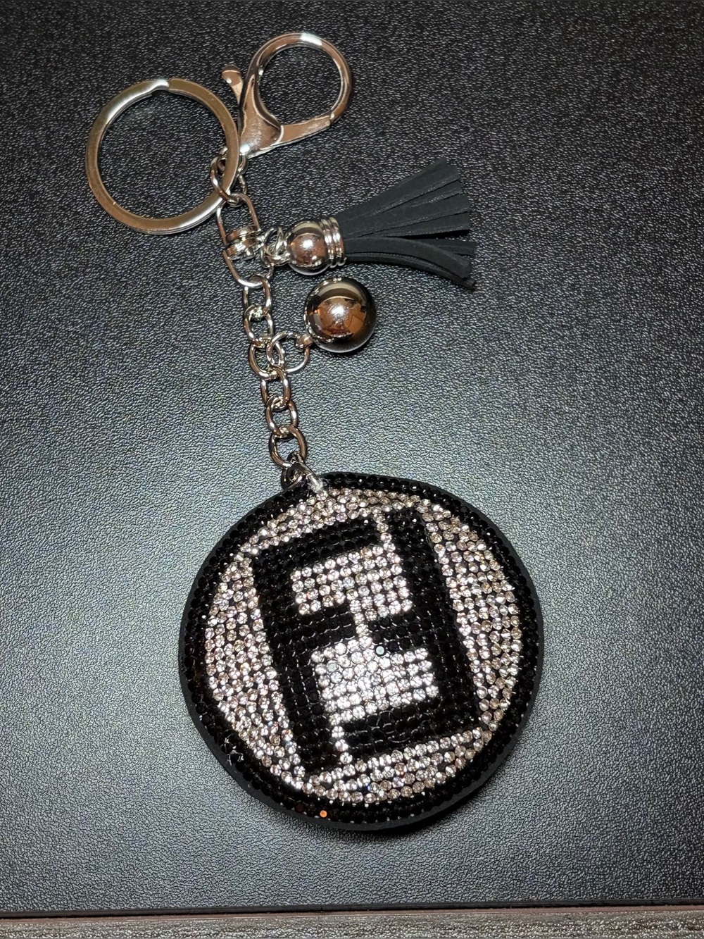 Source Unknown Black and Silver Rhinestone Round Keychain with Tassel